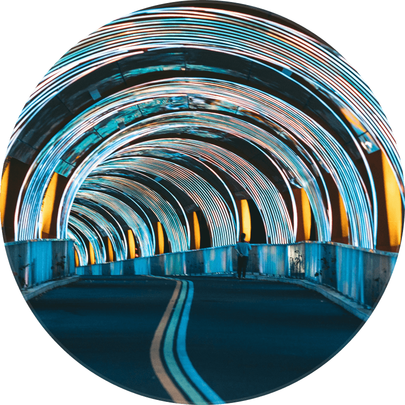 Tunnel of light — illuminated bridge interior representing the Beyondwork journey